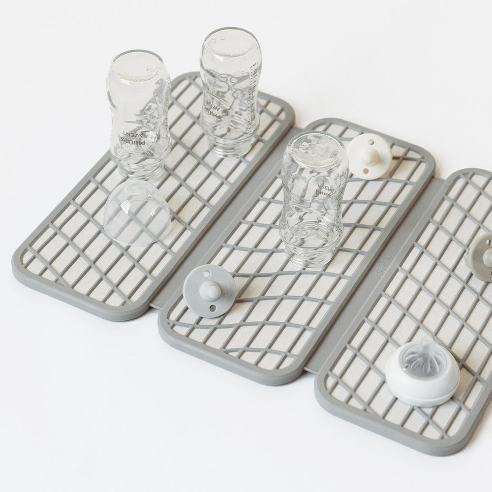 dish drying stone mat with baby bottles