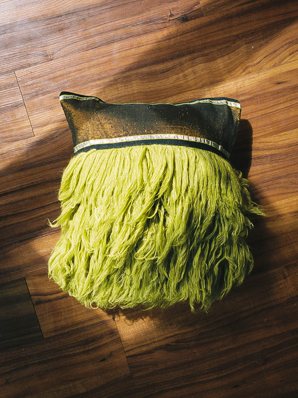 Wugo Throw Pillow (Black/Galapagos Green)