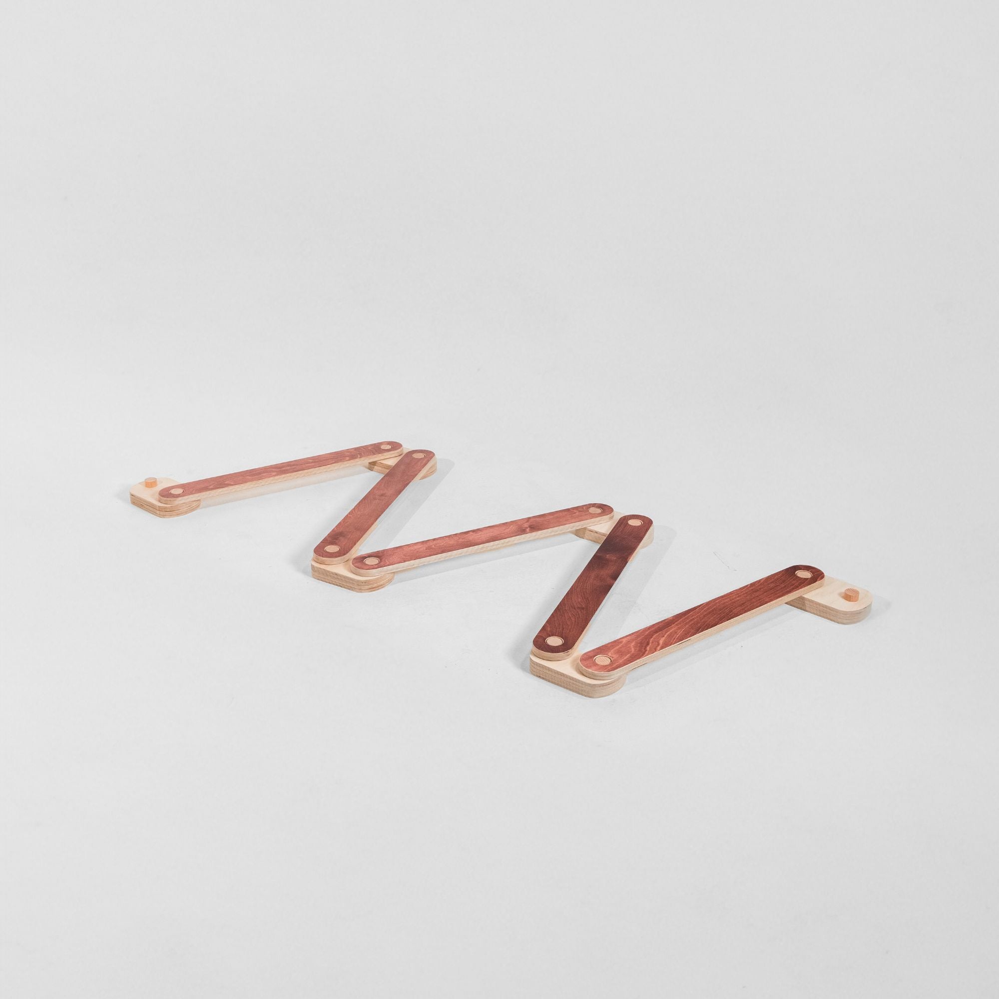 Child learning balance skills with a beam