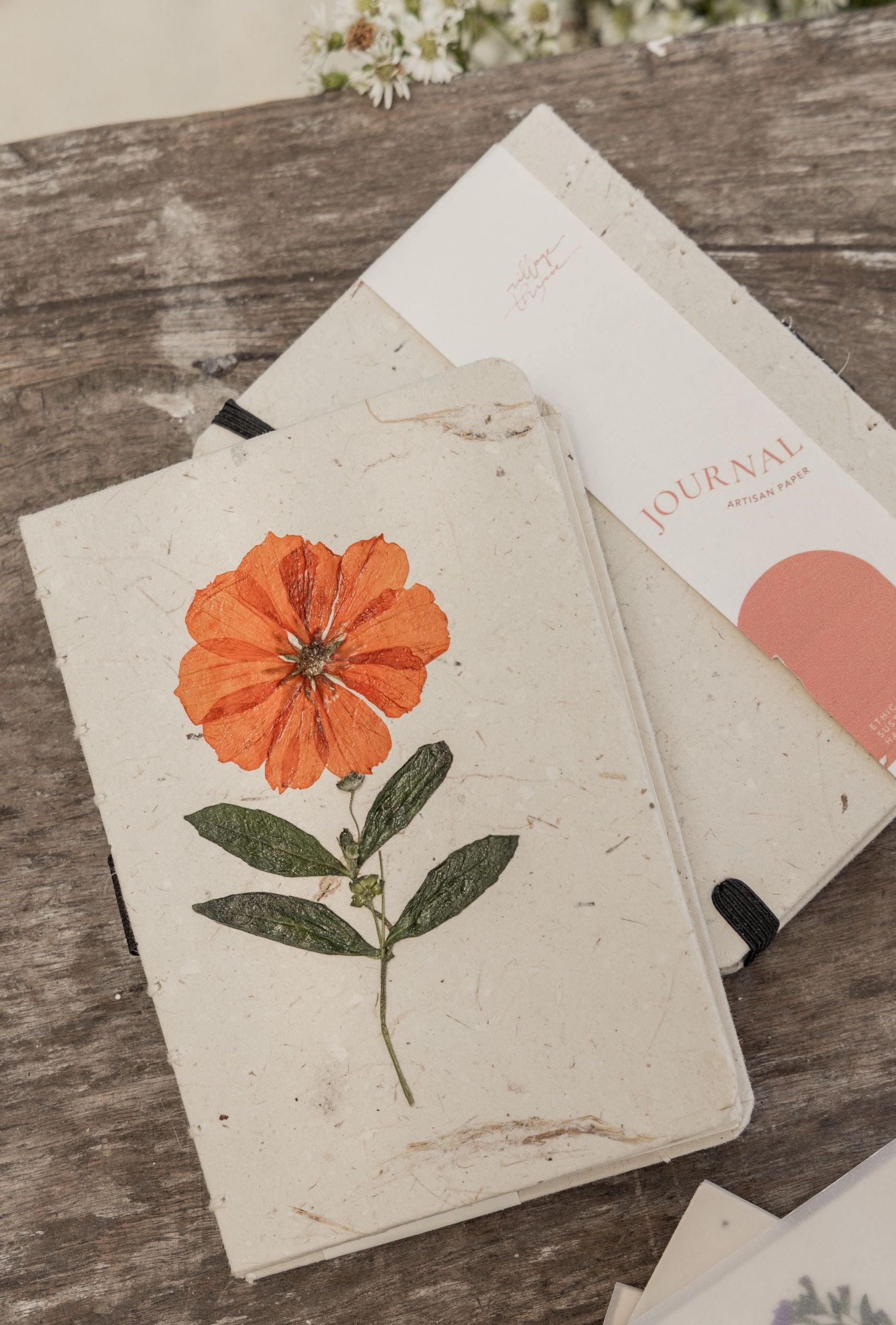 Handcrafted Journal with Pressed Flowers 4x6 handmade by Village Thrive using natural materials.