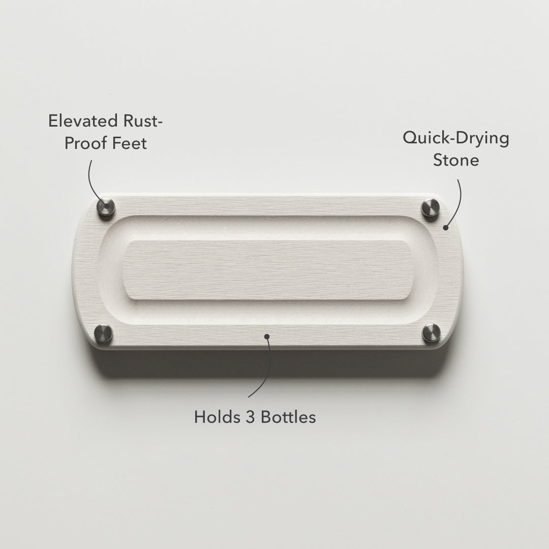 elevated rust proof feet on sink caddy that holds 3 bottles