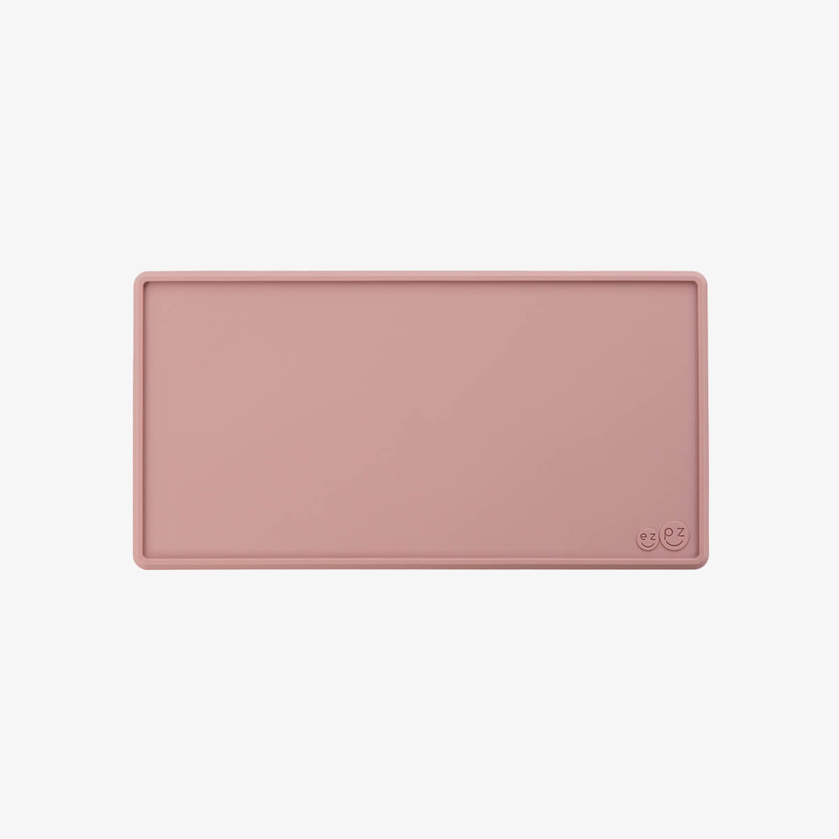 The Tiny Placemat in Blush is a non-slip, silicone placemat that fits on most highchair trays #color_blush