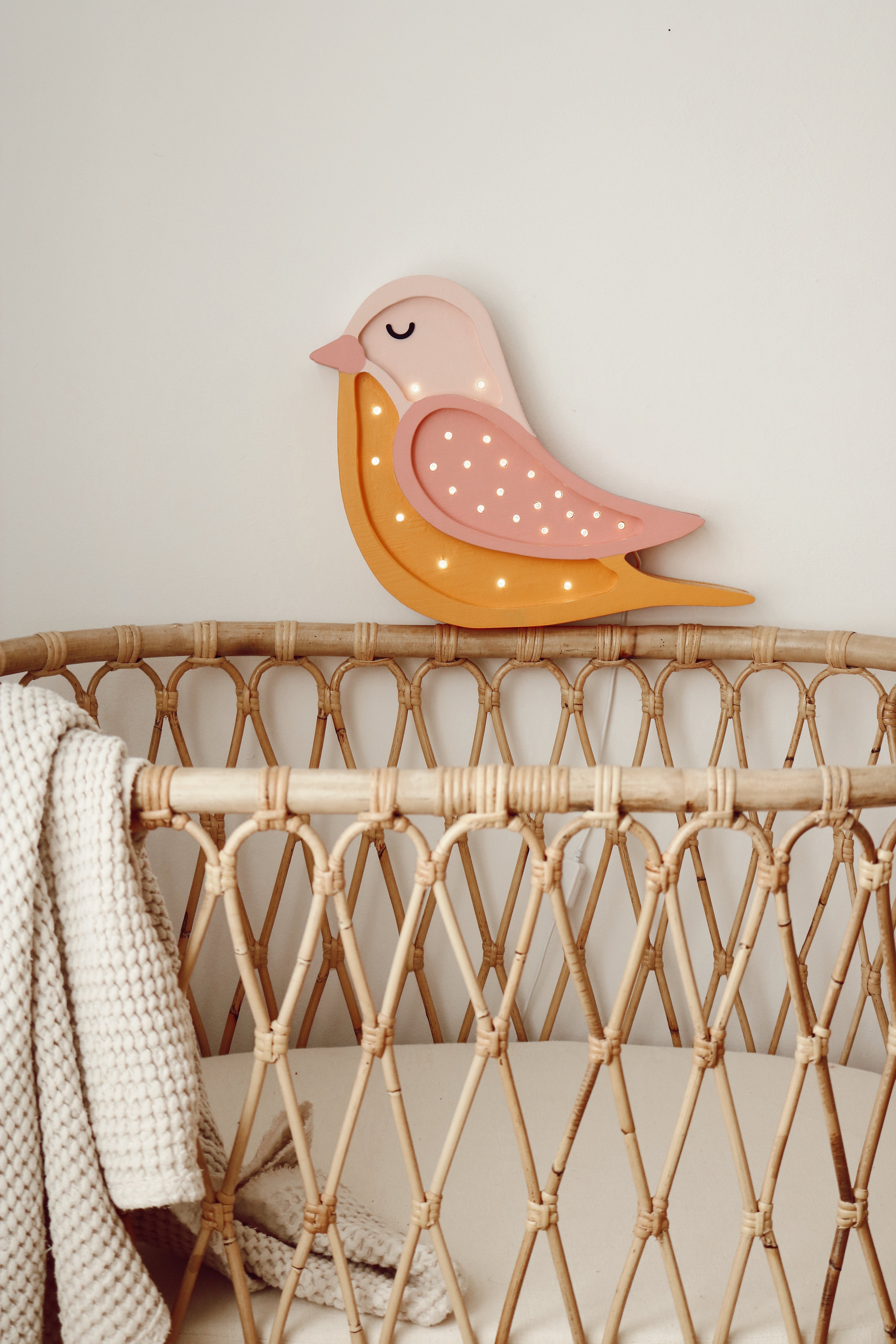 Bird Honey Rose Lamp glowing softly in nursery – kids room décor wooden night light.
