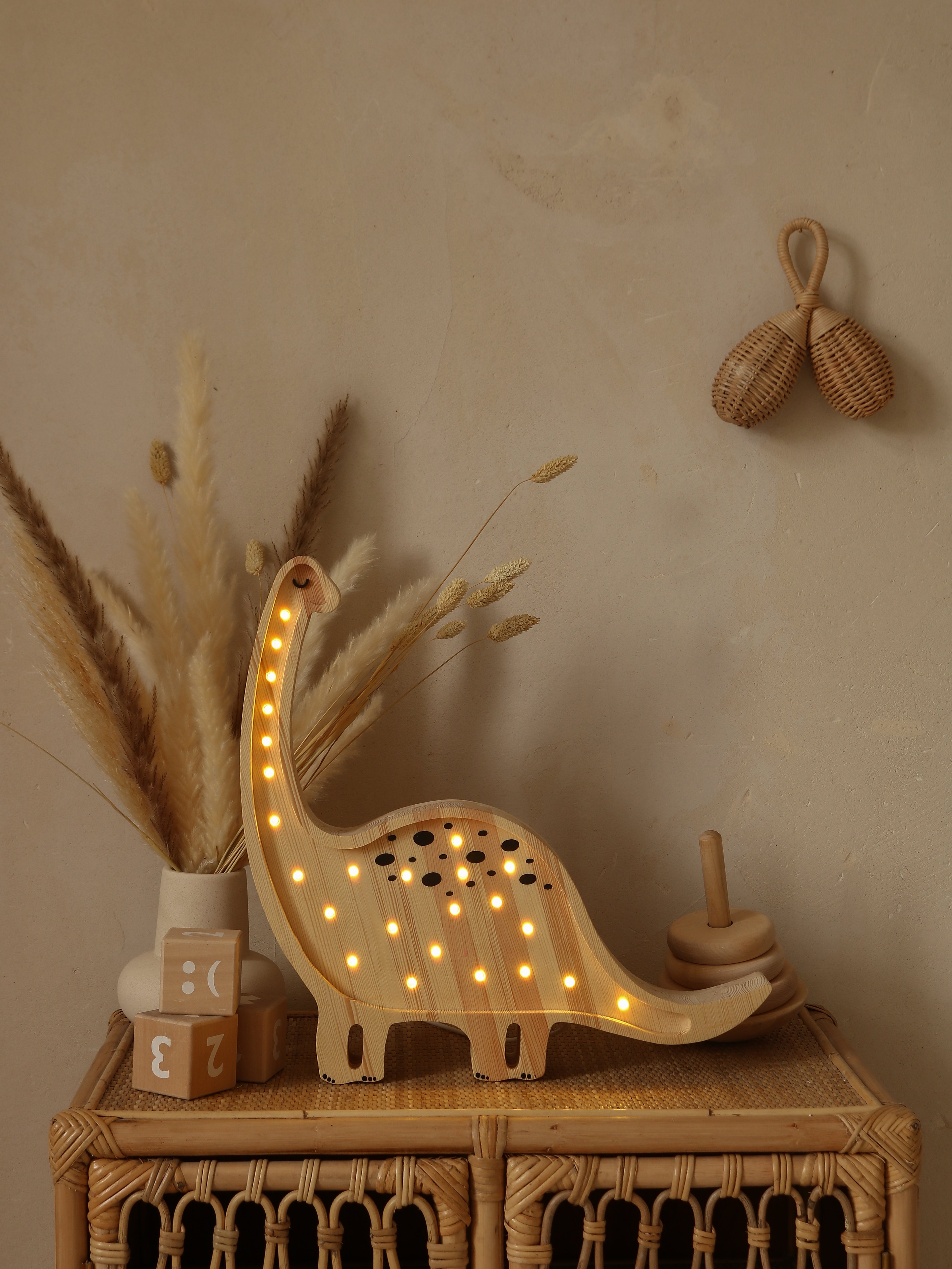 Dimmable Jurassic Wood Diplodocus Lamp with soft LED lighting.