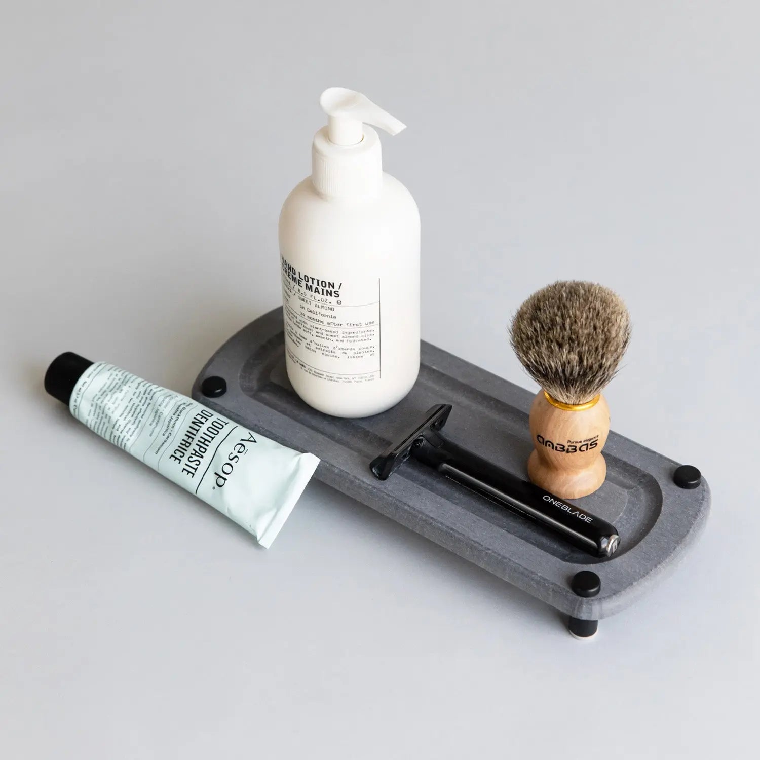 sink caddy with shaving razor and lotion