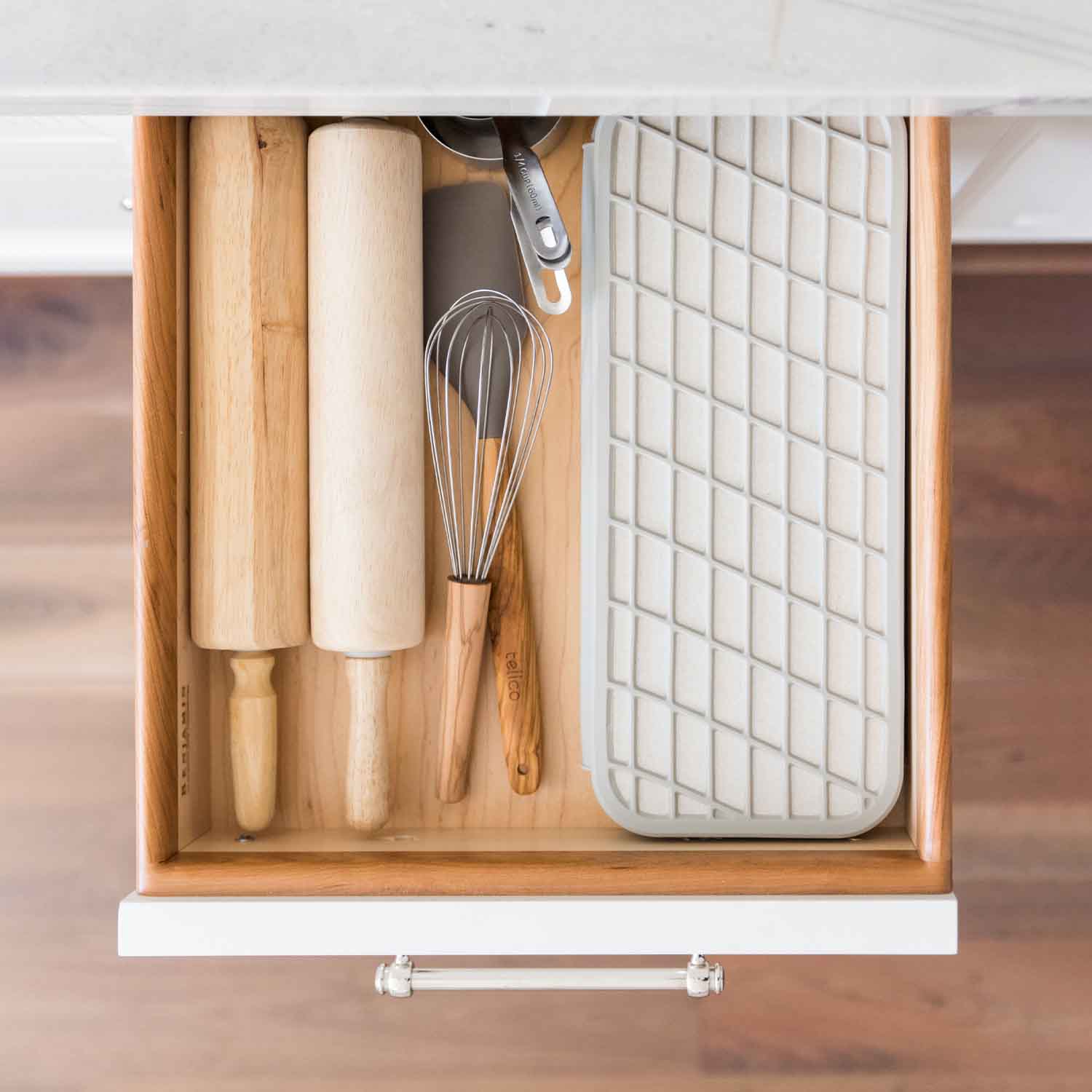 off white dish mat made from stone and silicone in drawer for easy storage