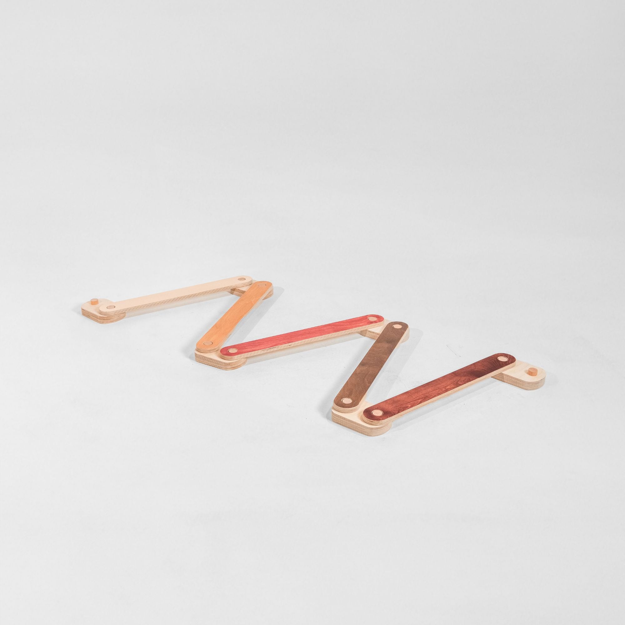 Child walking across a balance beam