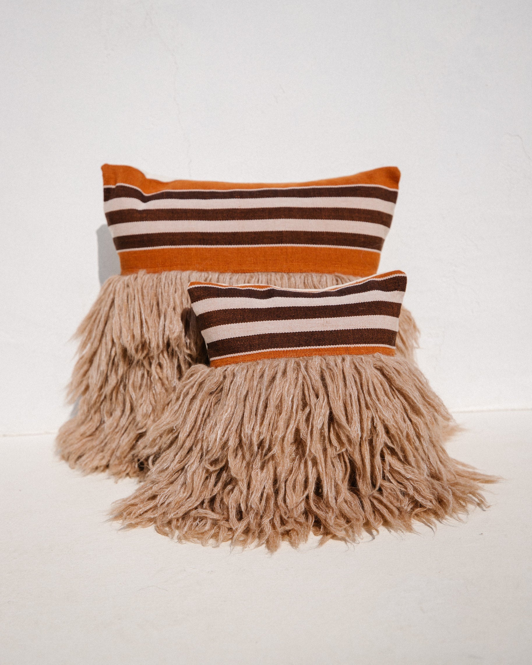 Wugo Throw Pillow (Rust Stripe/Andes Sand)