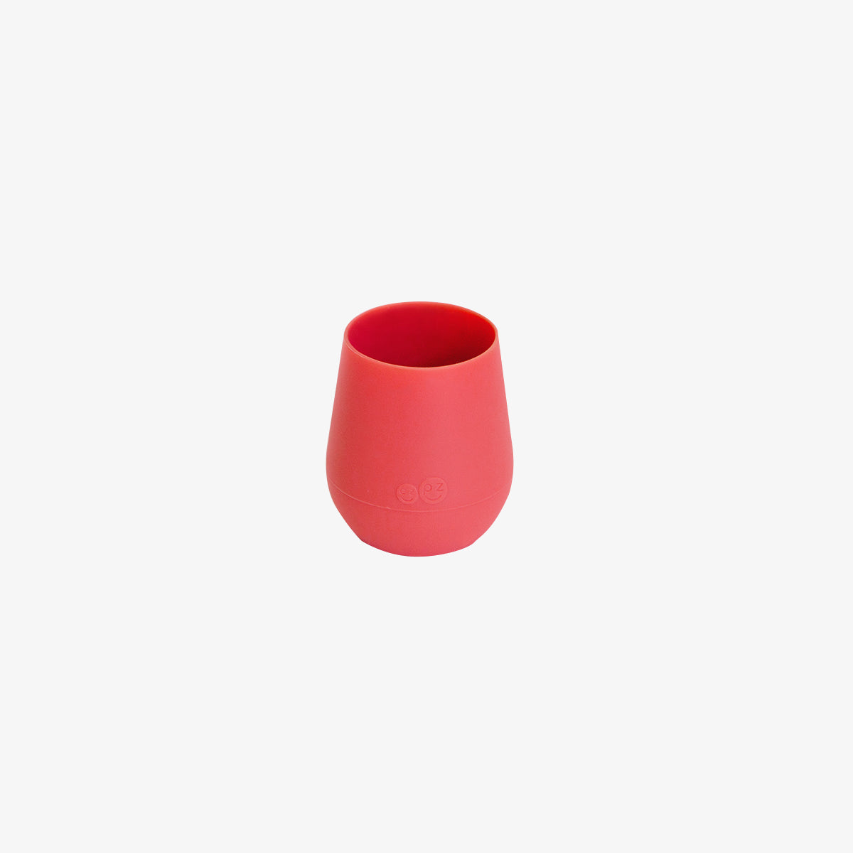 The Tiny Cup in Coral by ezpz / Open-Top, Silicone Drinking Cup for Babies #color_coral