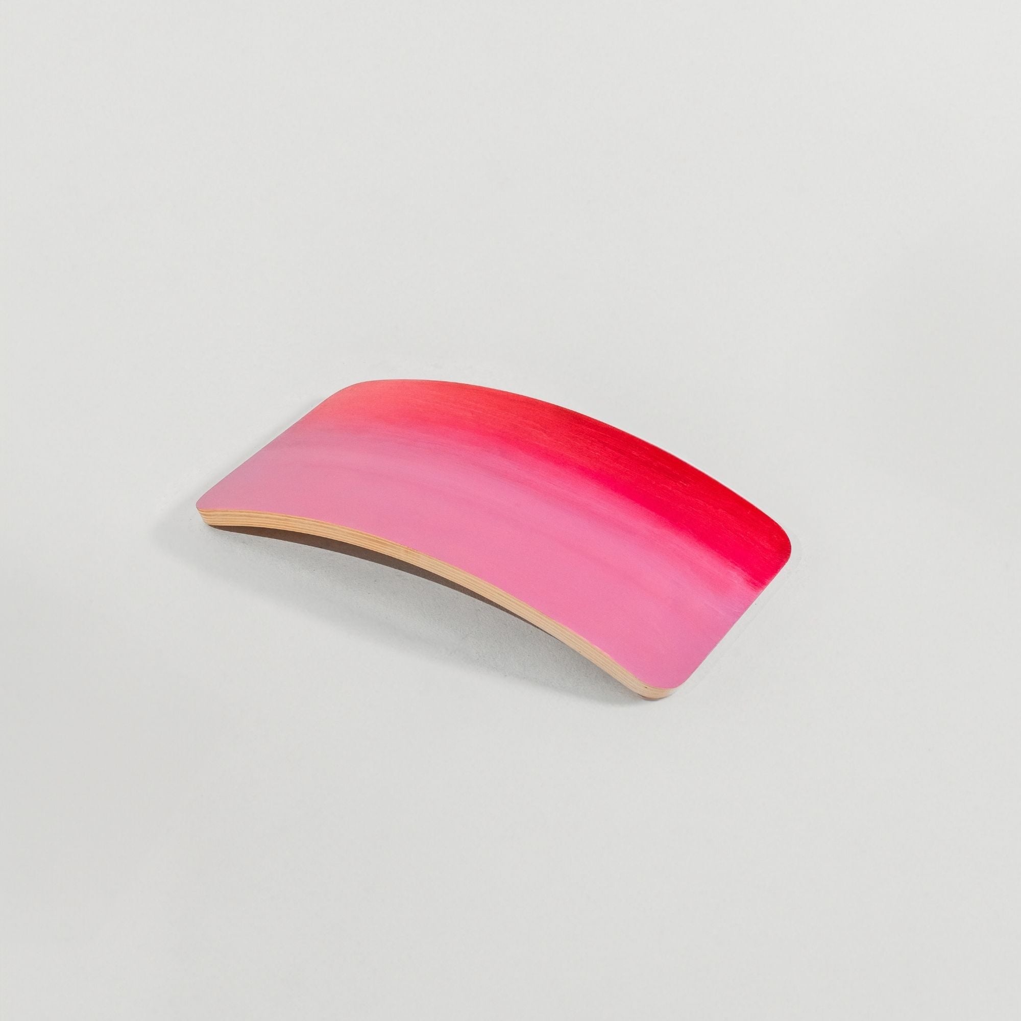 Child's balance challenge on wobble board