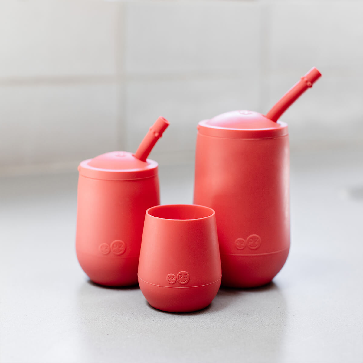 ezpz Developmental Cup Set in Coral #color_coral