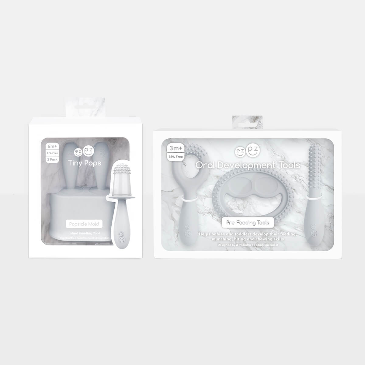 Pre-feeding set by ezpz in pewter light gray includes the tiny pops and oral development tools (silicone teethers) #color_pewter
