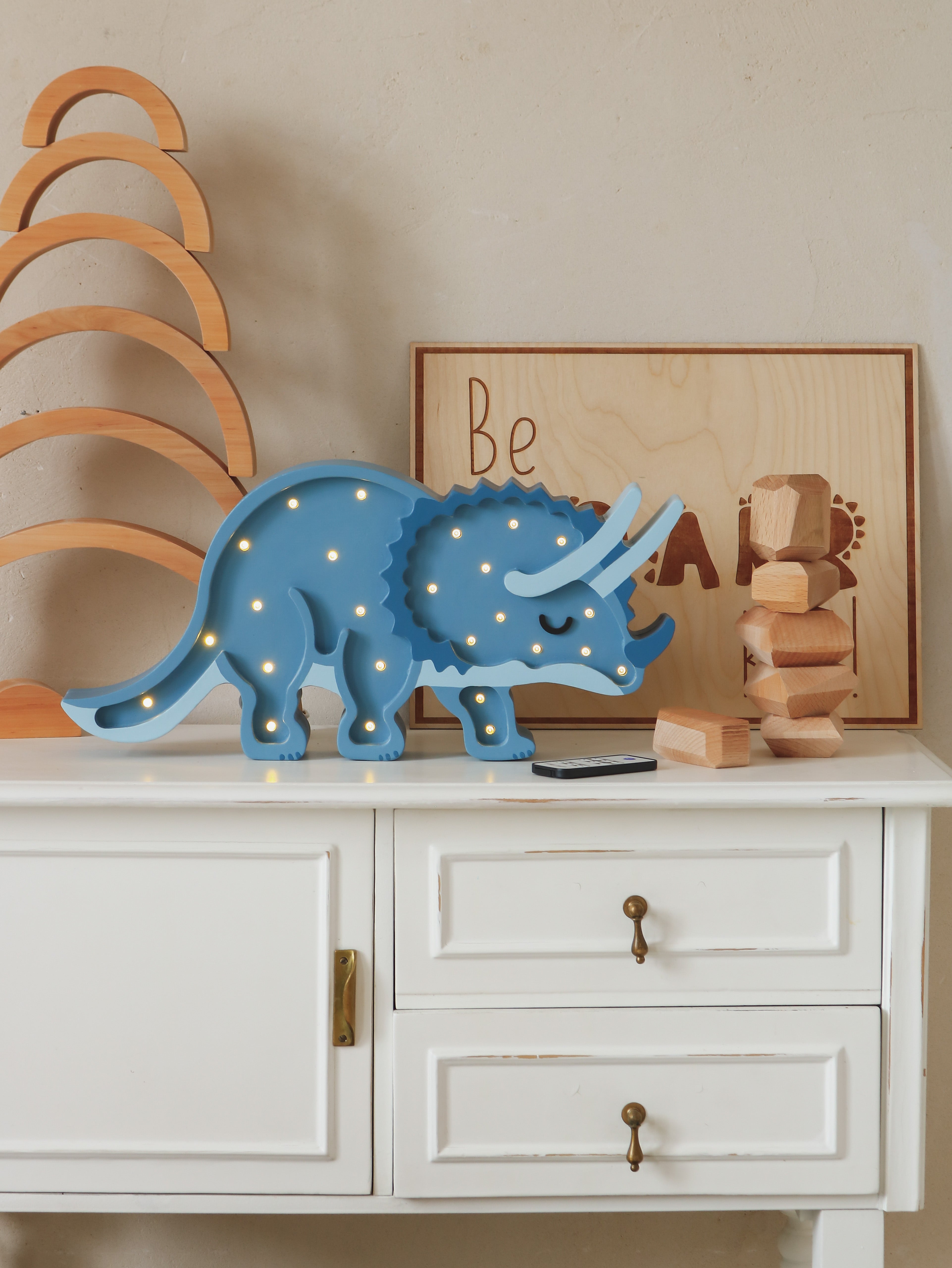 Cozy nursery dinosaur lamp in Jurassic Navy, Little Lights handmade wooden Triceratops