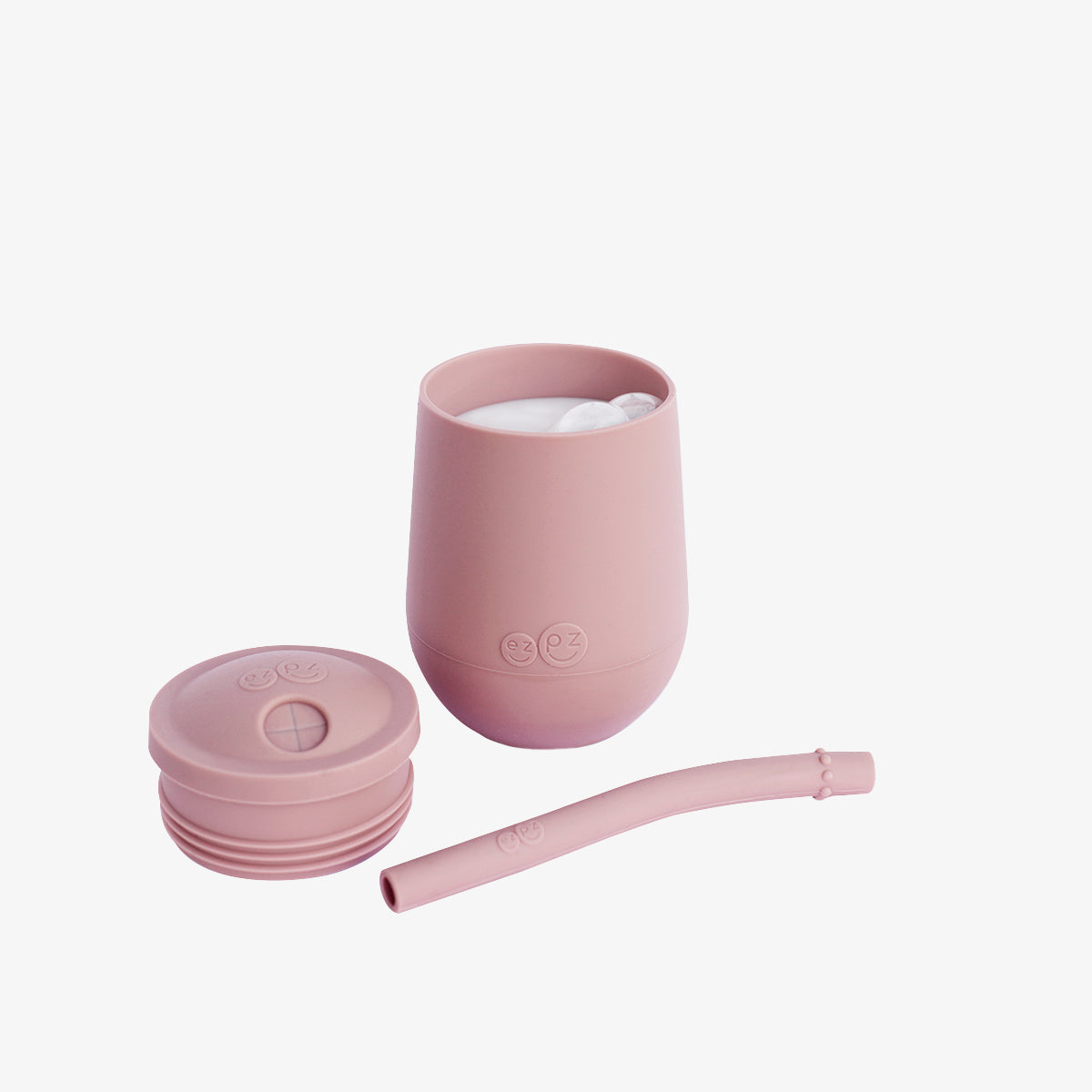 The Mini Cup + Straw in Blush by ezpz / Silicone Drinking Cup and Straw Training System for Toddlers #color_blush