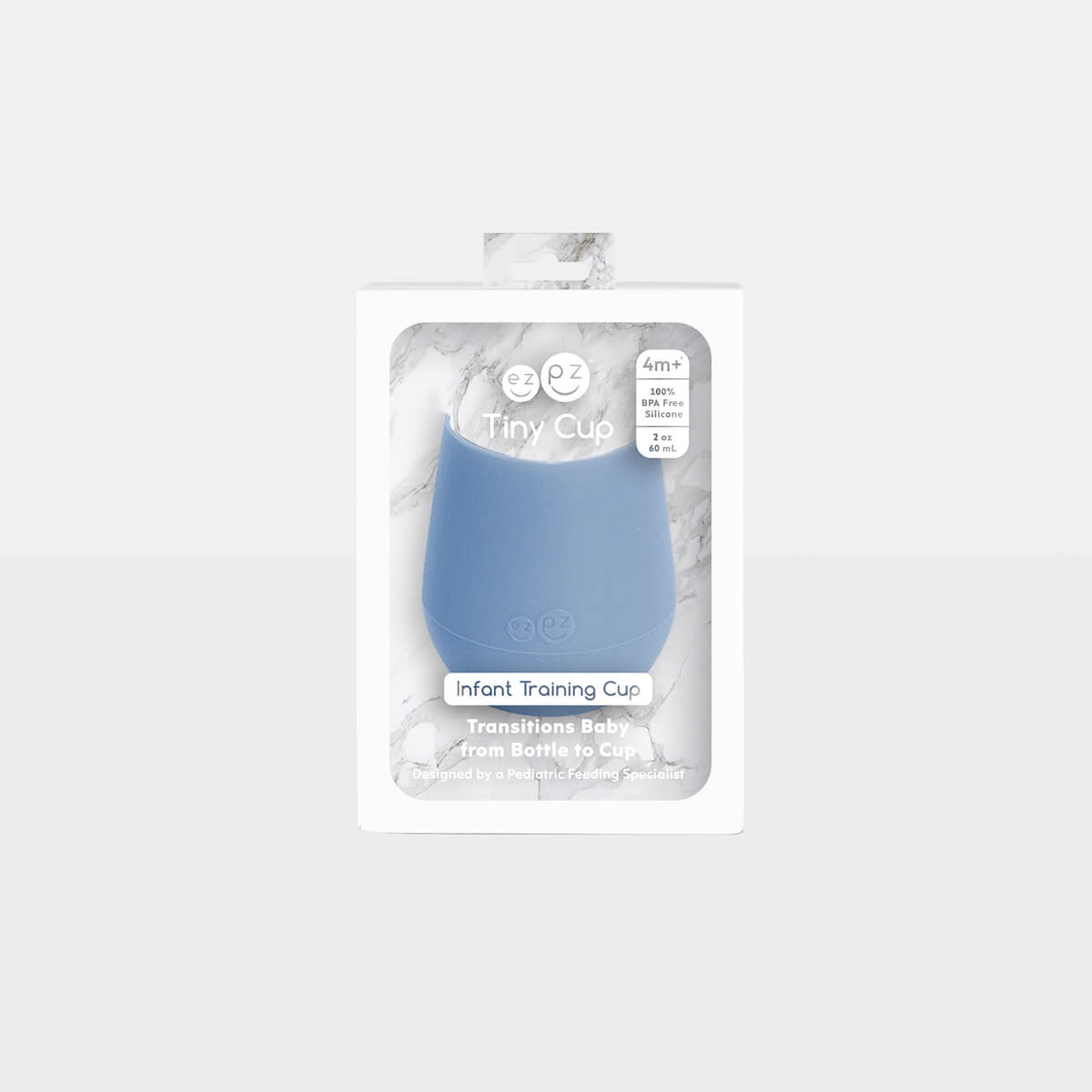 The Tiny Cup in Indigo by ezpz / Open-Top, Silicone Drinking Cup for Babies #color_indigo
