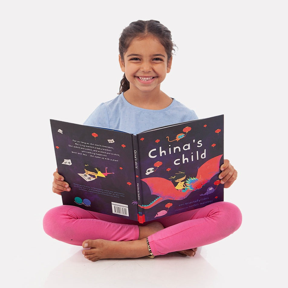 girl reading book about chinese culture