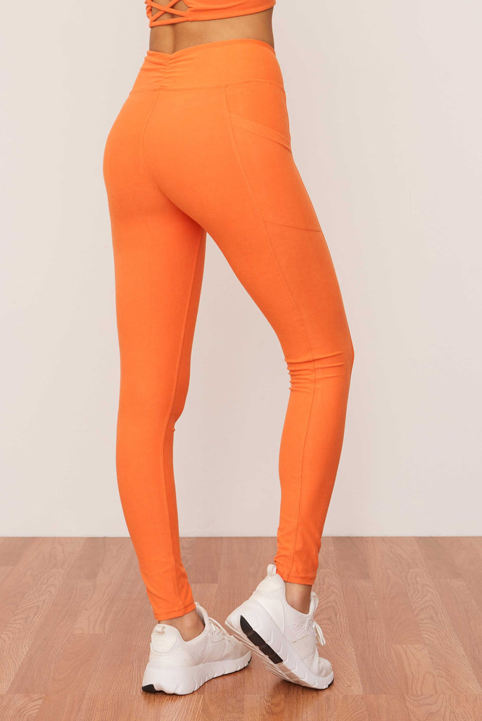 Ruched Crossover Pocket Legging (Tangerine) Pants Wolven 